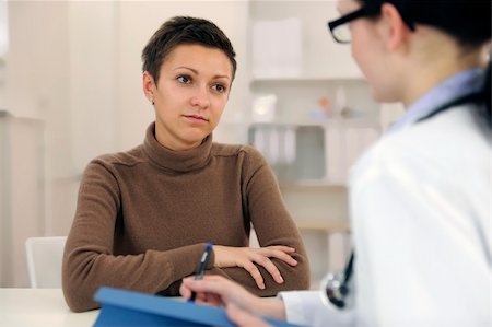 doctor feeling - Psychologist and depressed patient at office during consultation Stock Photo - Budget Royalty-Free & Subscription, Code: 400-06174243