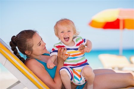 simsearch:400-06639191,k - Portrait of excited baby with mother on beach Stock Photo - Budget Royalty-Free & Subscription, Code: 400-06174348