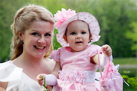 simsearch:400-08787277,k - Portrait of beautiful happy smiling mother with baby outdoor, on nature Stock Photo - Budget Royalty-Free & Subscription, Code: 400-06174458