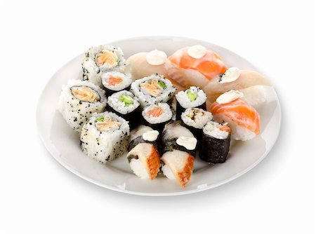 Sushi and rolls in a plate isolated on a white background. Clipping path Stock Photo - Budget Royalty-Free & Subscription, Code: 400-06174554