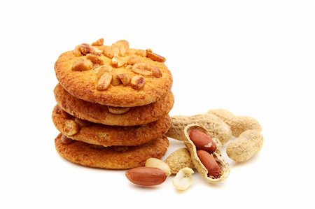 peanut cookie - Biscuits and peanuts on a white background. Stock Photo - Budget Royalty-Free & Subscription, Code: 400-06174644