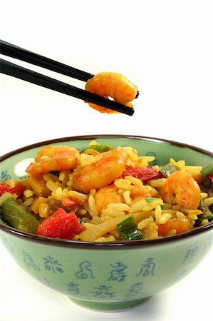 Rice with asian shrimp in asian dishes Stockbilder - Microstock & Abonnement, Bildnummer: 400-06174896