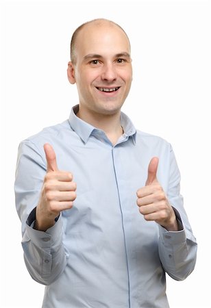simsearch:400-06795514,k - happy man gesturing thumbs up over white background Photographie de stock - Aubaine LD & Abonnement, Code: 400-06175046
