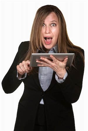 Excited woman holding tablet over white background Stock Photo - Budget Royalty-Free & Subscription, Code: 400-06175396