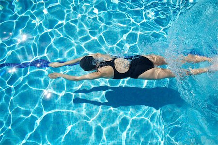 female glasses athlete - woman with swimsuit, swimming Foto de stock - Super Valor sin royalties y Suscripción, Código: 400-06175721