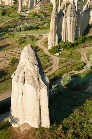 simsearch:400-06176435,k - Failry Chimneys in Cappadocia, Turkey on dramatic sky background Photographie de stock - Aubaine LD & Abonnement, Code: 400-06176435