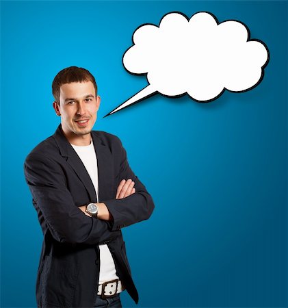 Business man with speech bubble, looking on camera Stock Photo - Budget Royalty-Free & Subscription, Code: 400-06176506