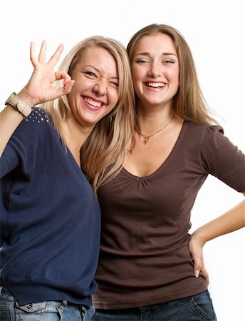 simsearch:400-05881632,k - Gay couple, two women looking on camera against white background Stock Photo - Budget Royalty-Free & Subscription, Code: 400-06176513