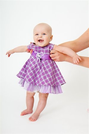 simsearch:400-04140663,k - little girl with a beautiful dress on a white background Photographie de stock - Aubaine LD & Abonnement, Code: 400-06176746