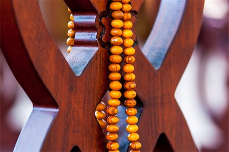 simsearch:400-04152433,k - rosaries made â??â??of wood on wood carving Photographie de stock - Aubaine LD & Abonnement, Code: 400-06176782