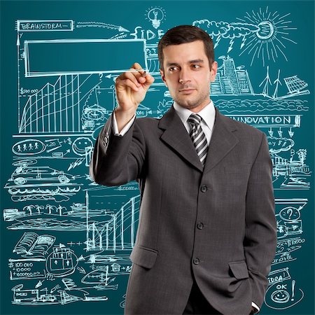 simsearch:400-06331783,k - Idea concept, man businessman writing something on glass board with marker Stock Photo - Budget Royalty-Free & Subscription, Code: 400-06176831