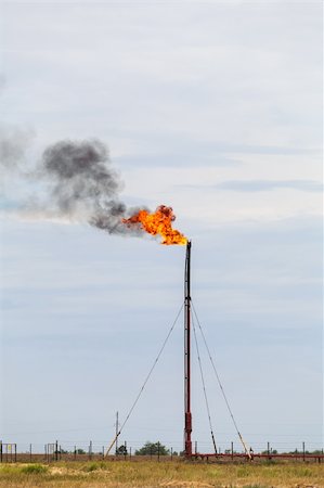 fogen (artist) - flaring of associated gas at oil refinery Stockbilder - Microstock & Abonnement, Bildnummer: 400-06177189