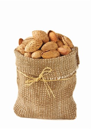 simsearch:400-04173906,k - Tasty almonds in a fabric rustic bag. Stock Photo - Budget Royalty-Free & Subscription, Code: 400-06177499