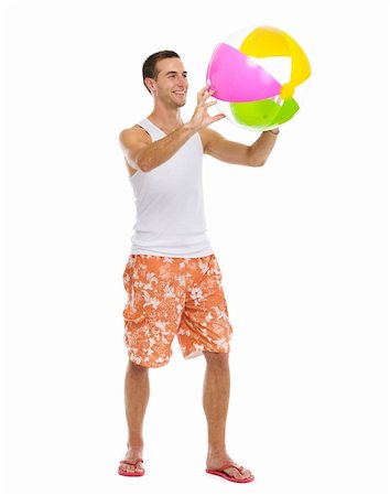 simsearch:400-04766687,k - Resting on vacation happy young man playing with beach ball Foto de stock - Super Valor sin royalties y Suscripción, Código: 400-06177597