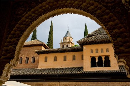 simsearch:841-05781716,k - View of court of lions at alhambra through arches of the pillars. Photographie de stock - Aubaine LD & Abonnement, Code: 400-06177650