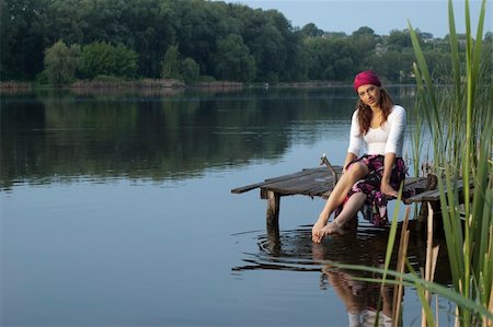 portrait of a beautiful young gypsy girl on the river bank. Stock Photo - Budget Royalty-Free & Subscription, Code: 400-06177932