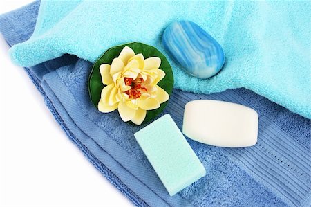 ruzanna (artist) - Towels, soaps and flower on white background. Foto de stock - Royalty-Free Super Valor e Assinatura, Número: 400-06177962