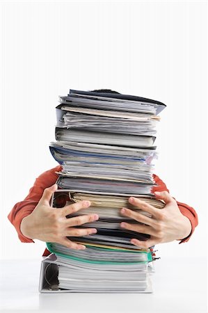 pile hands bussiness - Male hands holding pile of paperworks, over white background Stock Photo - Budget Royalty-Free & Subscription, Code: 400-06177988