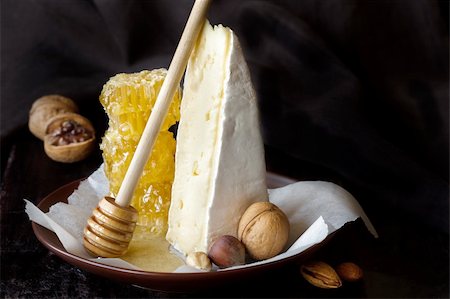 Delicious brie with honeycombs and nuts. Stock Photo - Budget Royalty-Free & Subscription, Code: 400-06178046