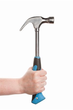 Female hand holding a hammer isolated on white background Stock Photo - Budget Royalty-Free & Subscription, Code: 400-06178270