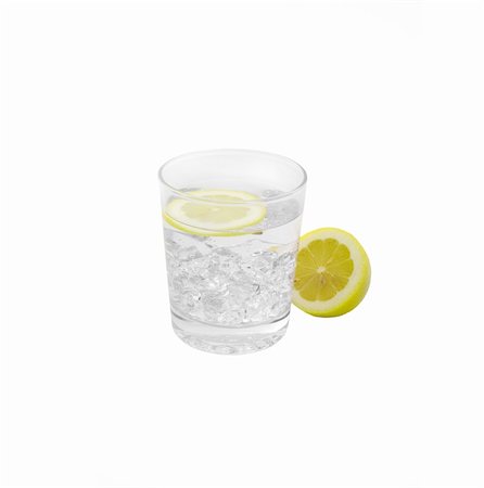 simsearch:649-07065047,k - fresh lemonade drink with lemon slice closeup isolated on white Stock Photo - Budget Royalty-Free & Subscription, Code: 400-06178574