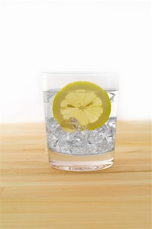 simsearch:400-04617727,k - fresh lemonade drink with lemon slice closeup Fotografie stock - Microstock e Abbonamento, Codice: 400-06178575