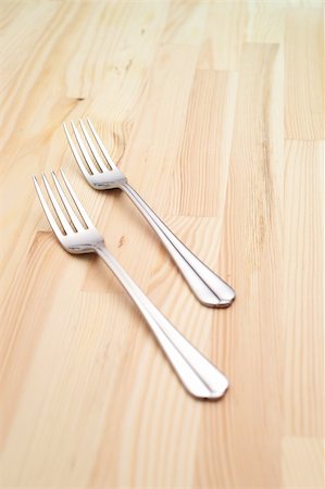 simsearch:400-07053389,k - two fork on a kitchen pinewood table closeup Stock Photo - Budget Royalty-Free & Subscription, Code: 400-06178582