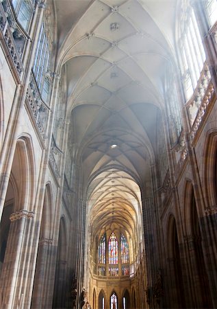 simsearch:400-05310861,k - Cathedral of St Vitus in the Prague castle is monumental Gothic church begun by Matthew of Arras in 1344 and the coronation cathedral of the Bohemian sovereigns, and the main of the Prague Roman - Catholic arcidiocese. The Gothic building was founded in 1344. The vault is 33 m and 124 m long.  Prague, Czech republic, Europe. Stock Photo - Budget Royalty-Free & Subscription, Code: 400-06179074