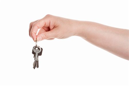 simsearch:400-04590086,k - Hand and keys isolated on white background Photographie de stock - Aubaine LD & Abonnement, Code: 400-06179204