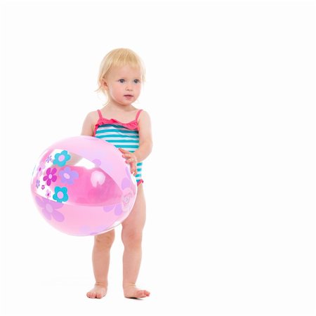 simsearch:400-04766687,k - Baby in swimsuit with inflatable beach ball Foto de stock - Super Valor sin royalties y Suscripción, Código: 400-06179228