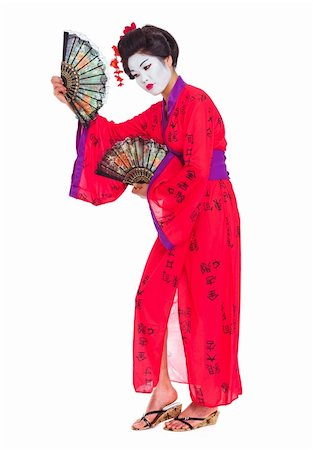 Full length portrait of geisha dancing with fans isolated on white Photographie de stock - Aubaine LD & Abonnement, Code: 400-06179318