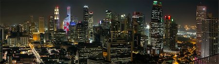 singapore building in the evening - Singapore City Skyline with Central Financial District and Chinatown at Night Panorama Stock Photo - Budget Royalty-Free & Subscription, Code: 400-06179511