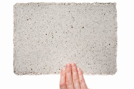 simsearch:400-06137807,k - Handmade paper in woman hand isolated on white background Foto de stock - Super Valor sin royalties y Suscripción, Código: 400-06179716