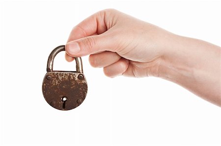 simsearch:400-04291722,k - Hand holding rusty old padlock isolated on white Stock Photo - Budget Royalty-Free & Subscription, Code: 400-06179721