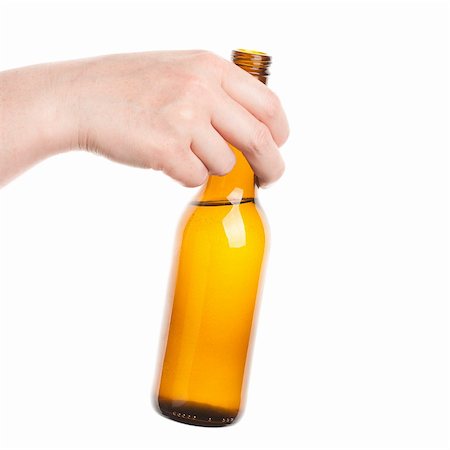 Beer bottle in the hand isolated on white Stock Photo - Budget Royalty-Free & Subscription, Code: 400-06179954