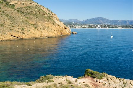 simsearch:400-06083036,k - The rocky shore that surrounds Altea bay Stock Photo - Budget Royalty-Free & Subscription, Code: 400-06170481