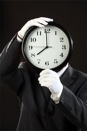 simsearch:400-09050917,k - Businessman hiding behind the big clock. Time for work concept Stock Photo - Budget Royalty-Free & Subscription, Code: 400-06171817