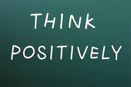 Think positively written with white chalk on a blackboard background Stock Photo - Budget Royalty-Free & Subscription, Code: 400-06172587