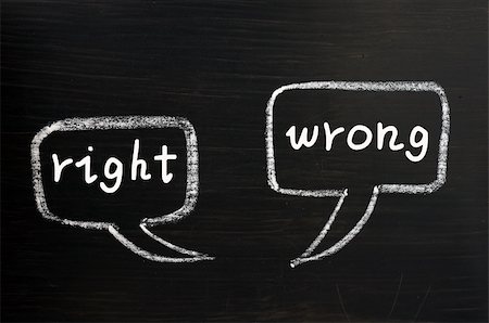 simsearch:400-06203150,k - Two speech bubbles for right and wrong written with white chalk on a blackboard Fotografie stock - Microstock e Abbonamento, Codice: 400-06172589