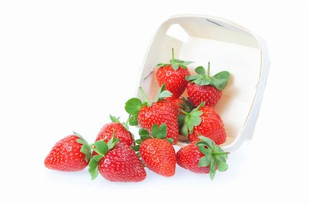 sergioua (artist) - Sprinkled strawberry from the basket. On a white background. Photographie de stock - Aubaine LD & Abonnement, Code: 400-06172701