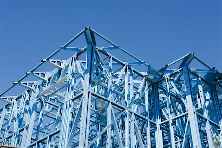 simsearch:600-07958213,k - New residential construction home metal framing against a blue sky Stock Photo - Budget Royalty-Free & Subscription, Code: 400-06173250