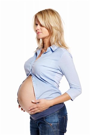 Portrait of a pregnant woman. Studio photo of pregnant woman isolated on white. Stock Photo - Budget Royalty-Free & Subscription, Code: 400-06173280