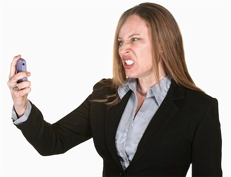 Woman with clenched teeth and telephone over white background Stock Photo - Budget Royalty-Free & Subscription, Code: 400-06173389