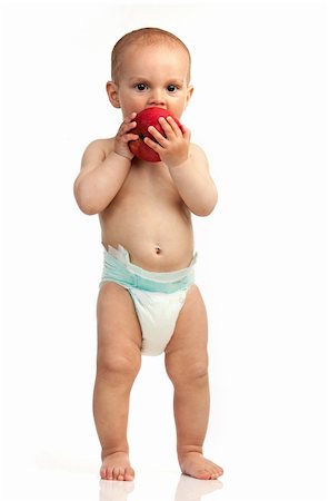 One-year old boy with red apple isolated over white background Stock Photo - Budget Royalty-Free & Subscription, Code: 400-06173965