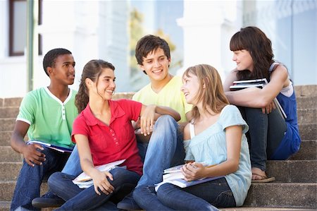 Group Of Teenage Friends Sitting On College Steps Outside Stock Photo - Budget Royalty-Free & Subscription, Code: 400-06204137