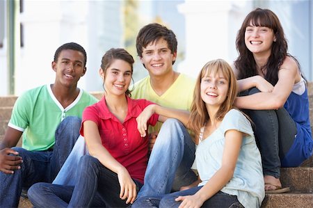 Group Of Teenage Friends Sitting On College Steps Outside Stock Photo - Budget Royalty-Free & Subscription, Code: 400-06204139