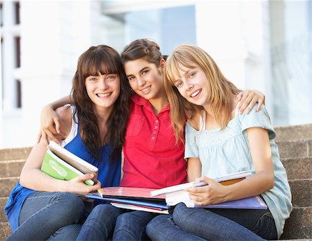 simsearch:400-06204445,k - Group Of Teenage Female Friends Sitting On College Steps Outside Foto de stock - Royalty-Free Super Valor e Assinatura, Número: 400-06204142
