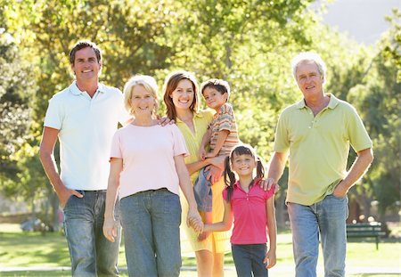 simsearch:400-06097548,k - Extended Group Portrait Of Family Enjoying Walk In Park Photographie de stock - Aubaine LD & Abonnement, Code: 400-06204264