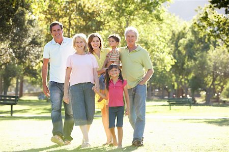 simsearch:400-06098367,k - Extended Group Portrait Of Family Enjoying Walk In Park Stock Photo - Budget Royalty-Free & Subscription, Code: 400-06204263