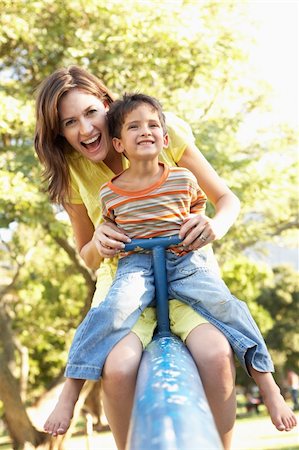 five year old - Mother And Son Riding On See Saw In Playground Stock Photo - Budget Royalty-Free & Subscription, Code: 400-06204273